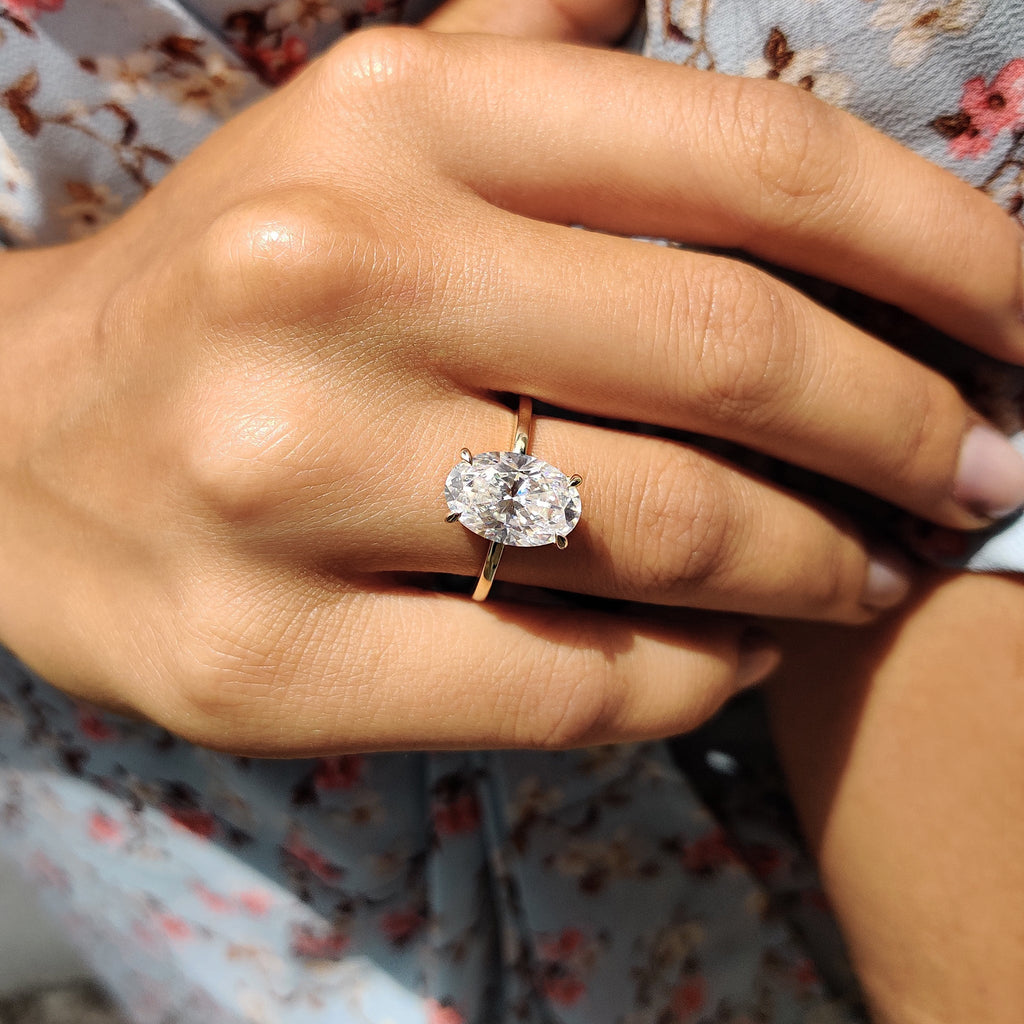 Oval Cut Engagement Ring With Hidden Halo Setting