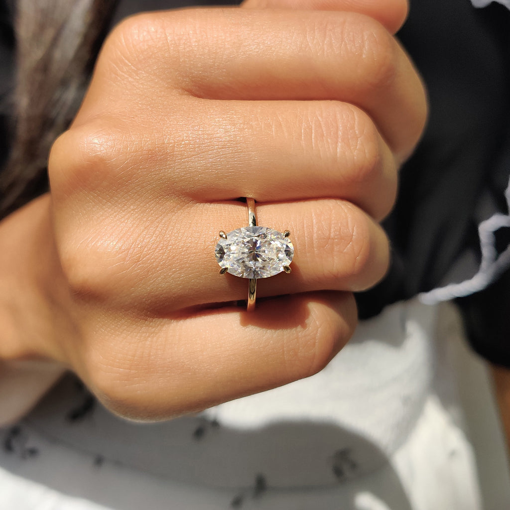 Oval Cut Engagement Ring With Hidden Halo Setting