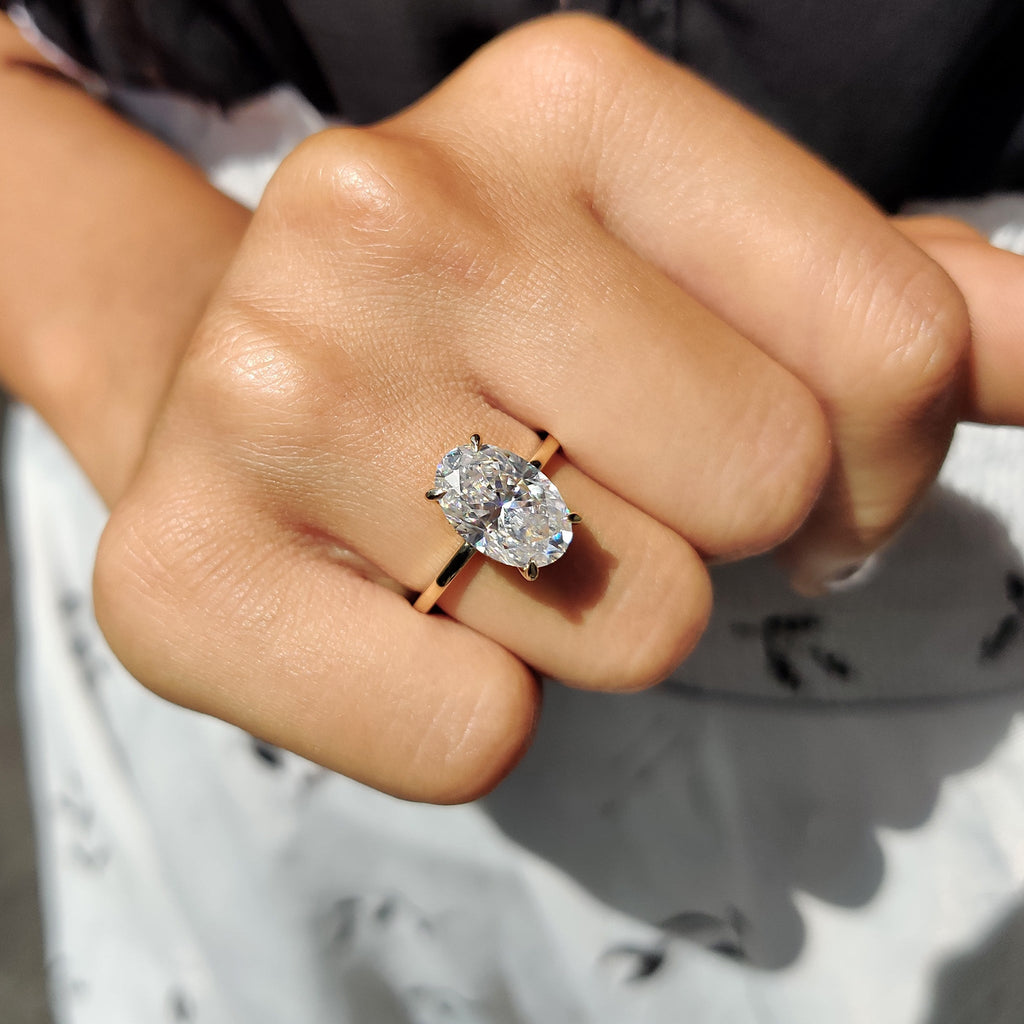 Oval Cut Engagement Ring With Hidden Halo Setting