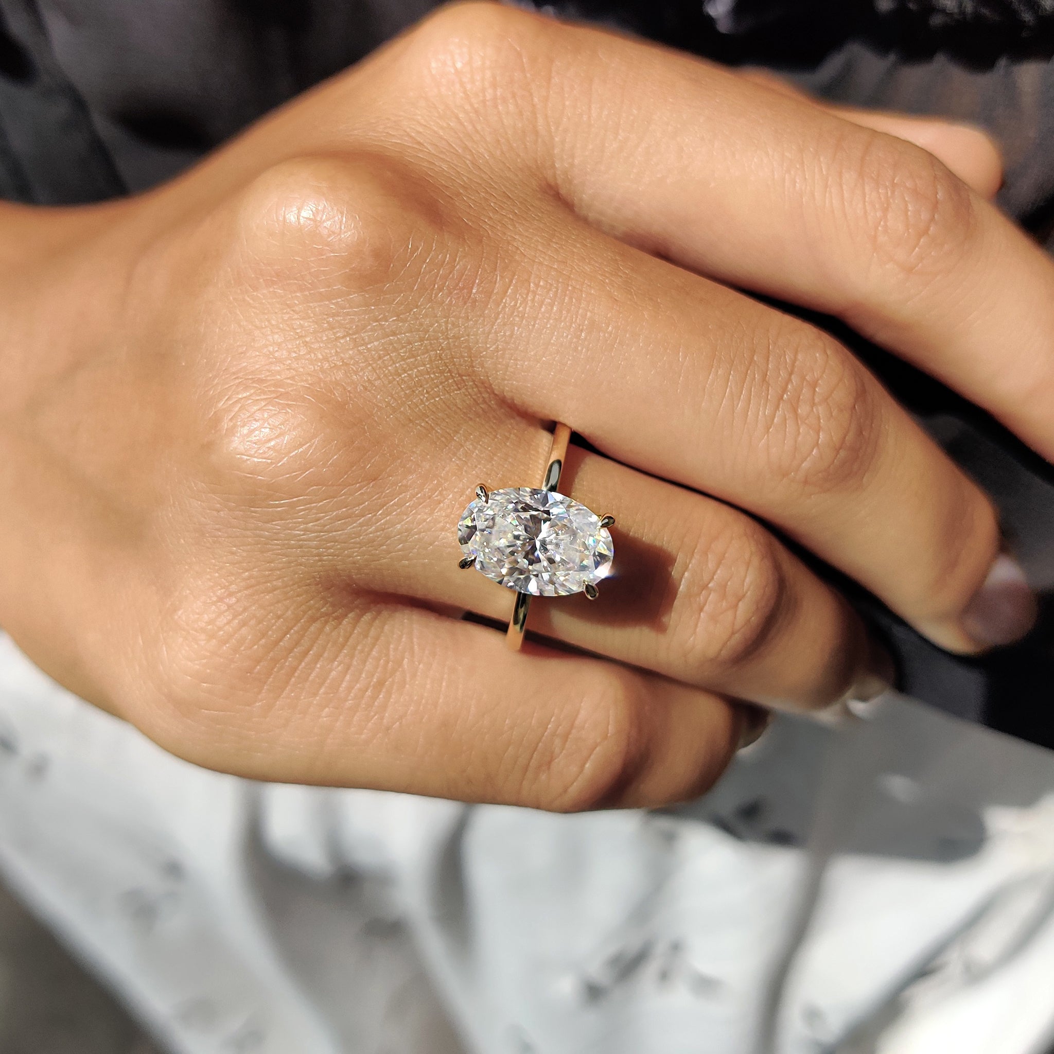 Oval Cut Engagement Ring With Hidden Halo Setting