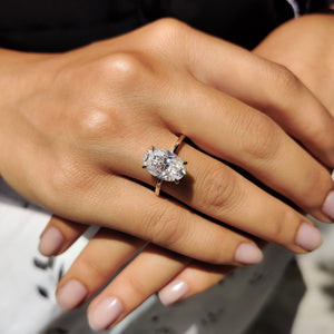 Oval Cut Engagement Ring With Hidden Halo Setting