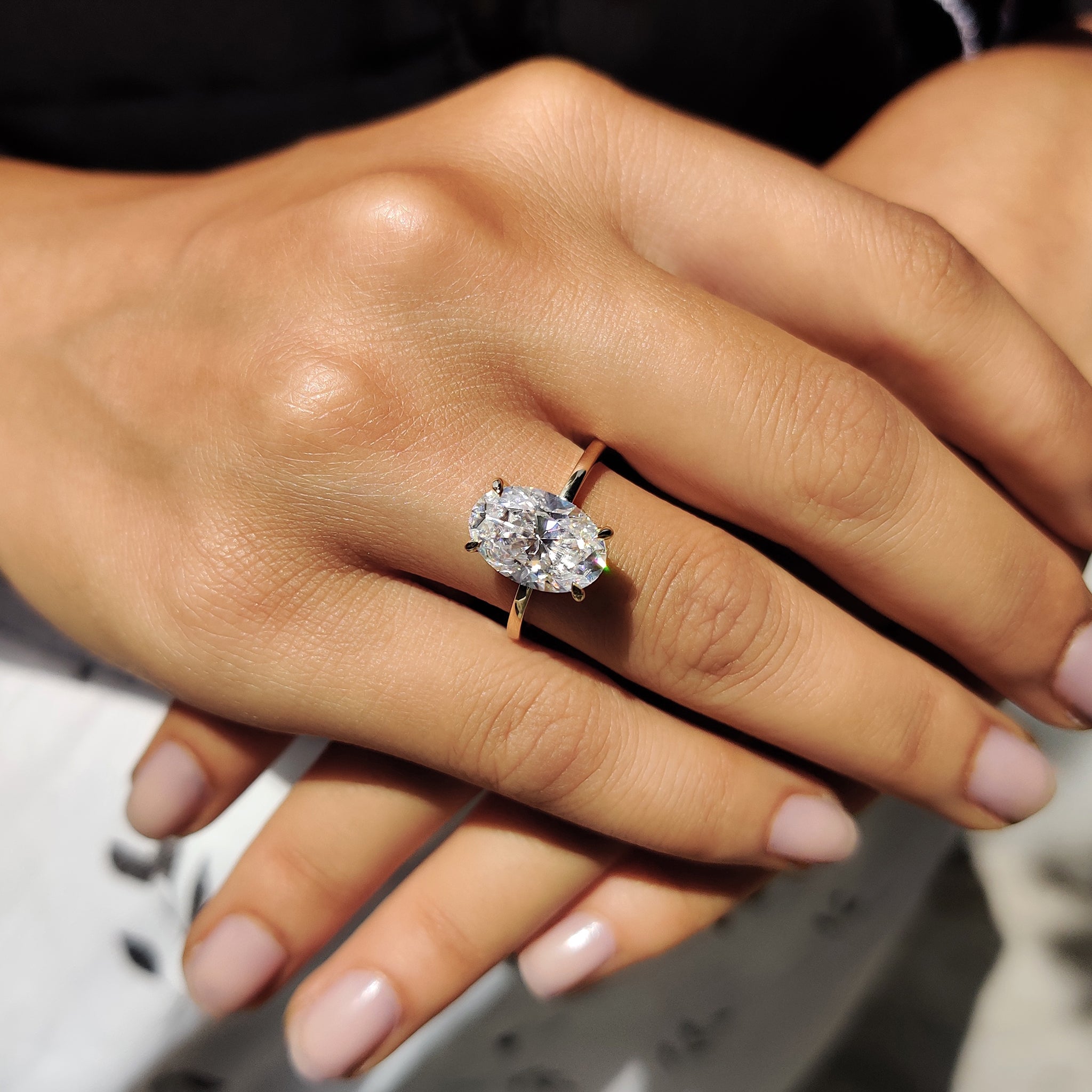 Oval Cut Engagement Ring With Hidden Halo Setting