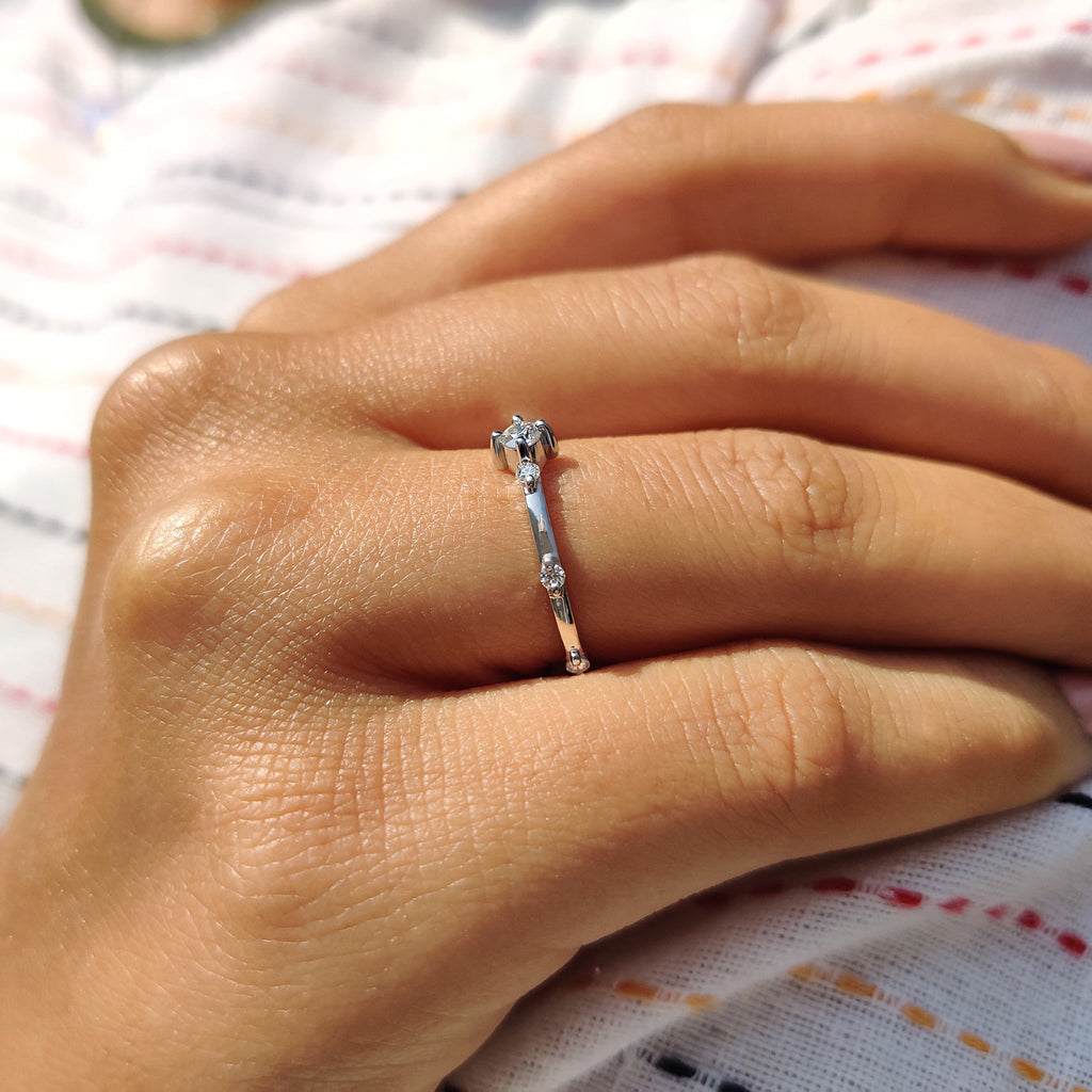 Delicate Distance Pave Wedding Band In Round Cut Moissanite