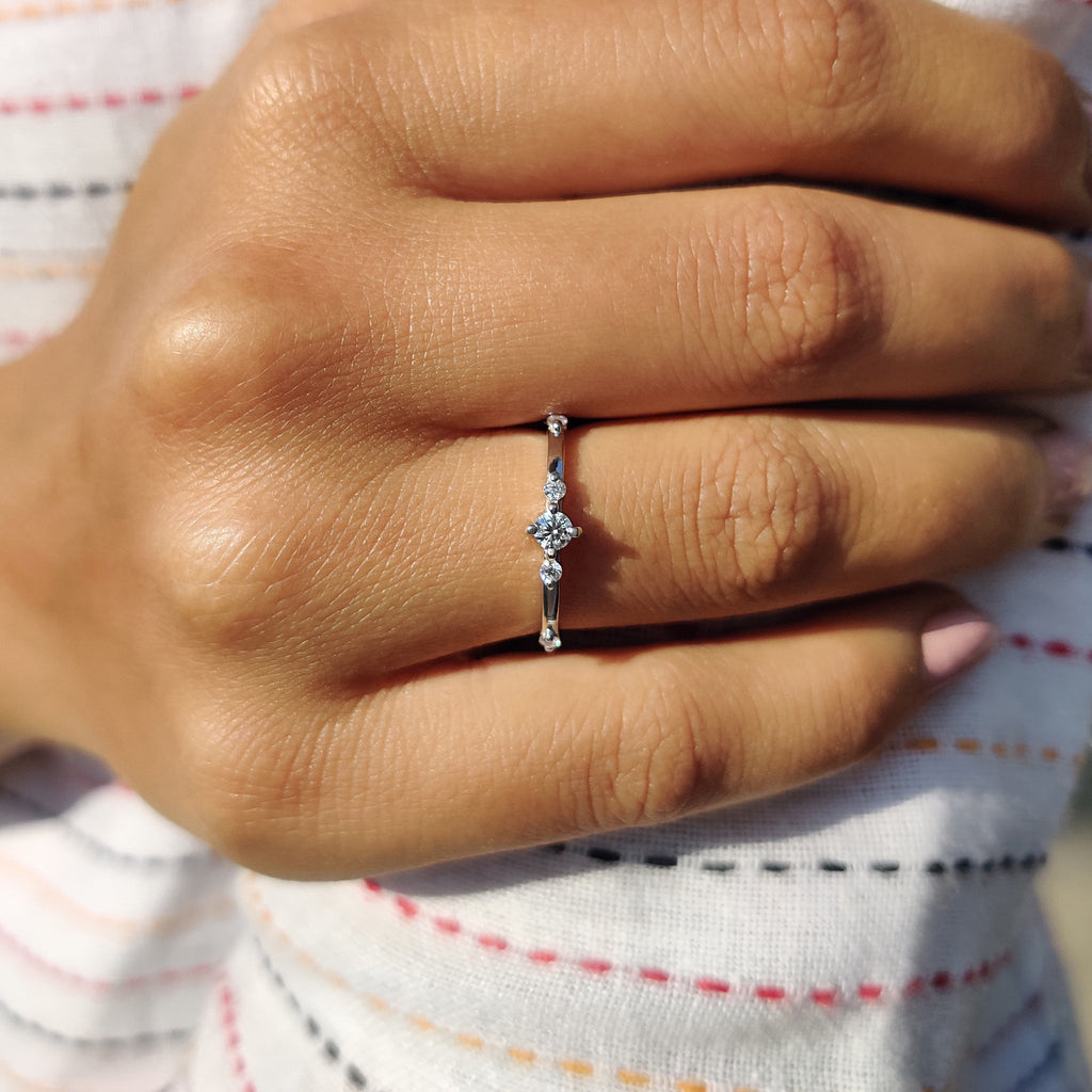 Delicate Distance Pave Wedding Band In Round Cut Moissanite