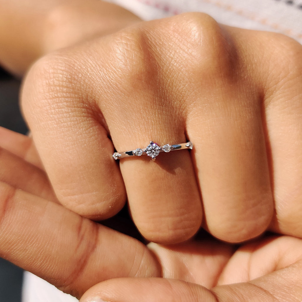 Delicate Distance Pave Wedding Band In Round Cut Moissanite