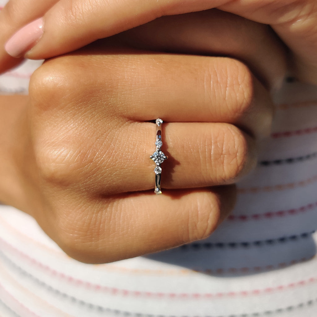 Delicate Distance Pave Wedding Band In Round Cut Moissanite