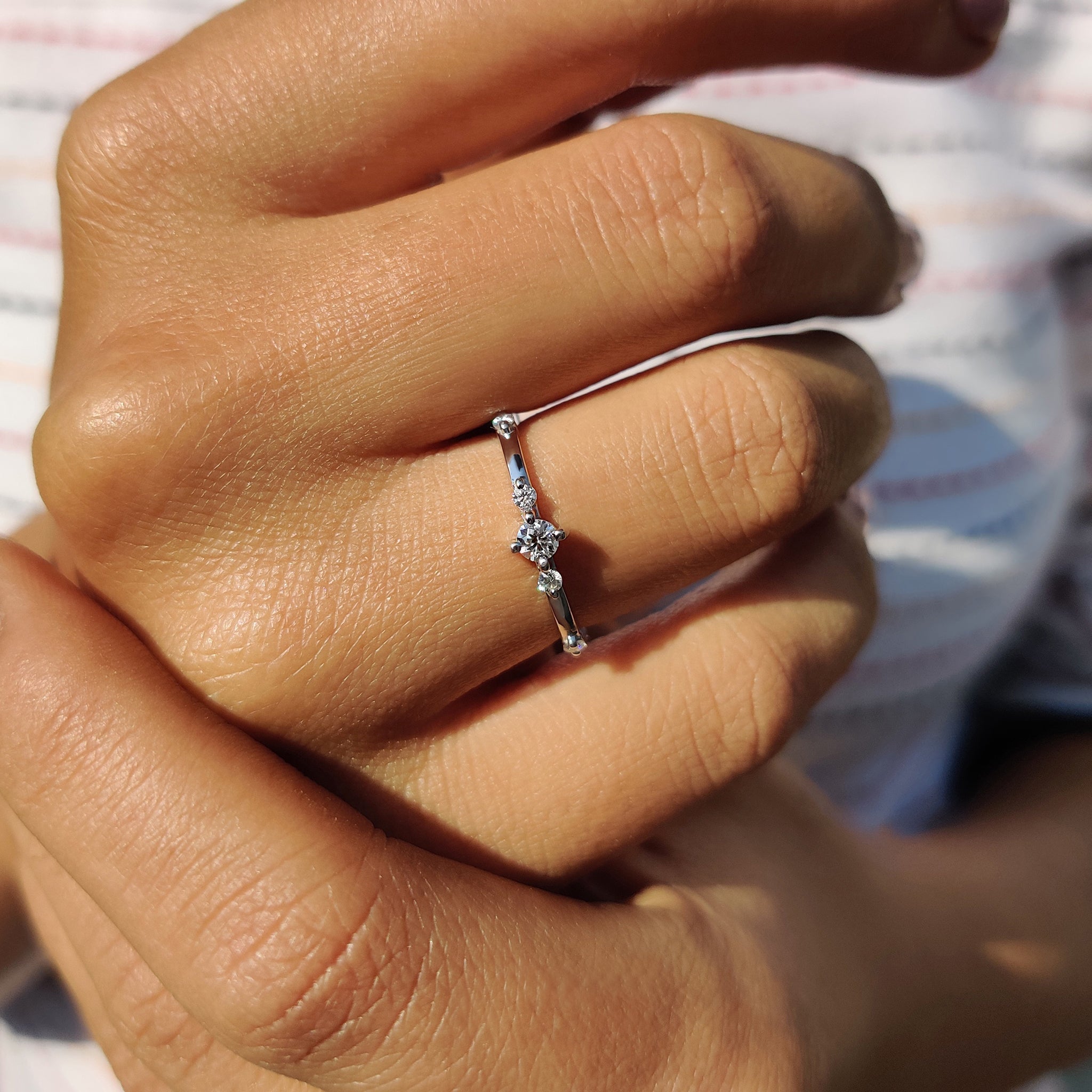 Delicate Distance Pave Wedding Band In Round Cut Moissanite