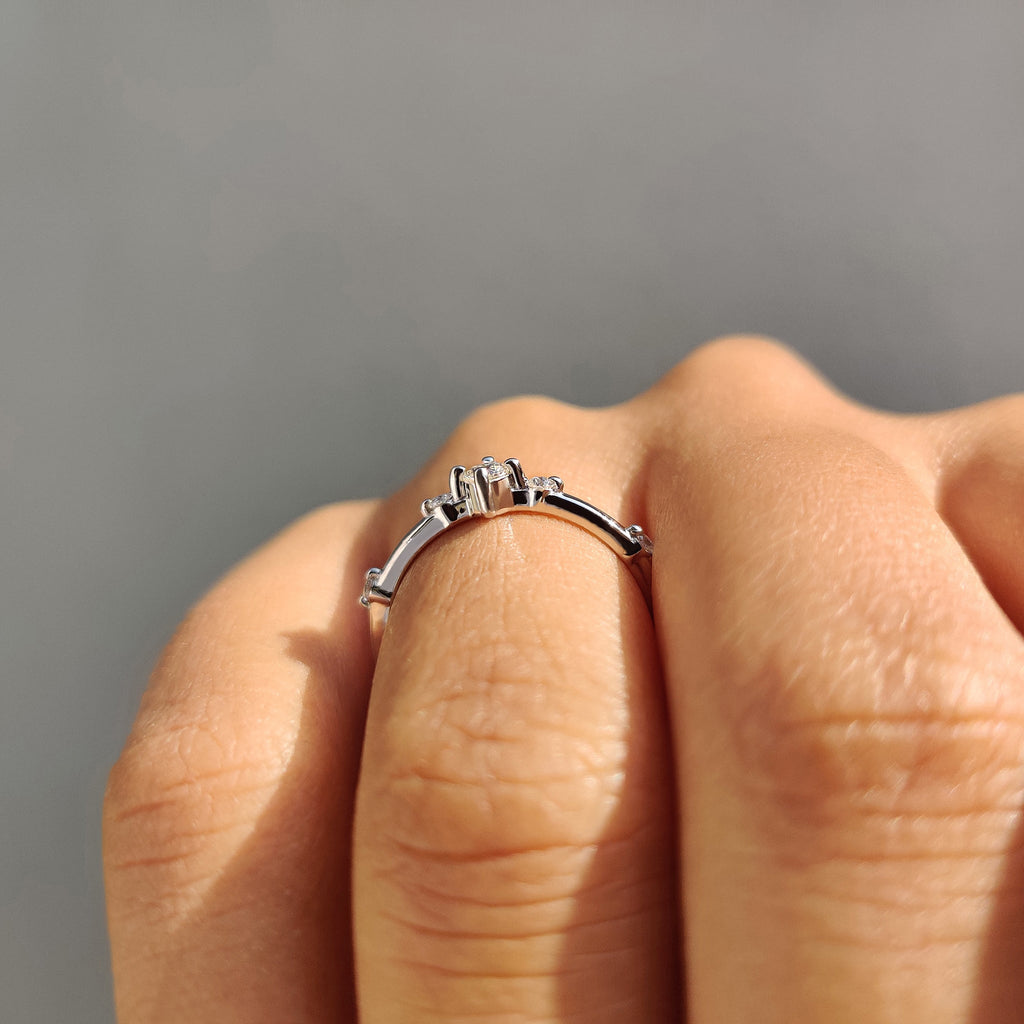 Delicate Distance Pave Wedding Band In Round Cut Moissanite