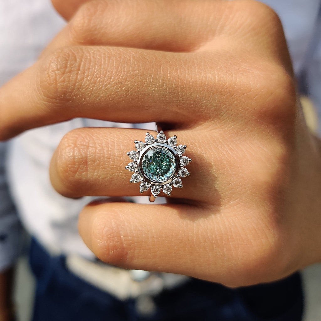 Halo And Bezel Portuguese Cut Engagement Ring