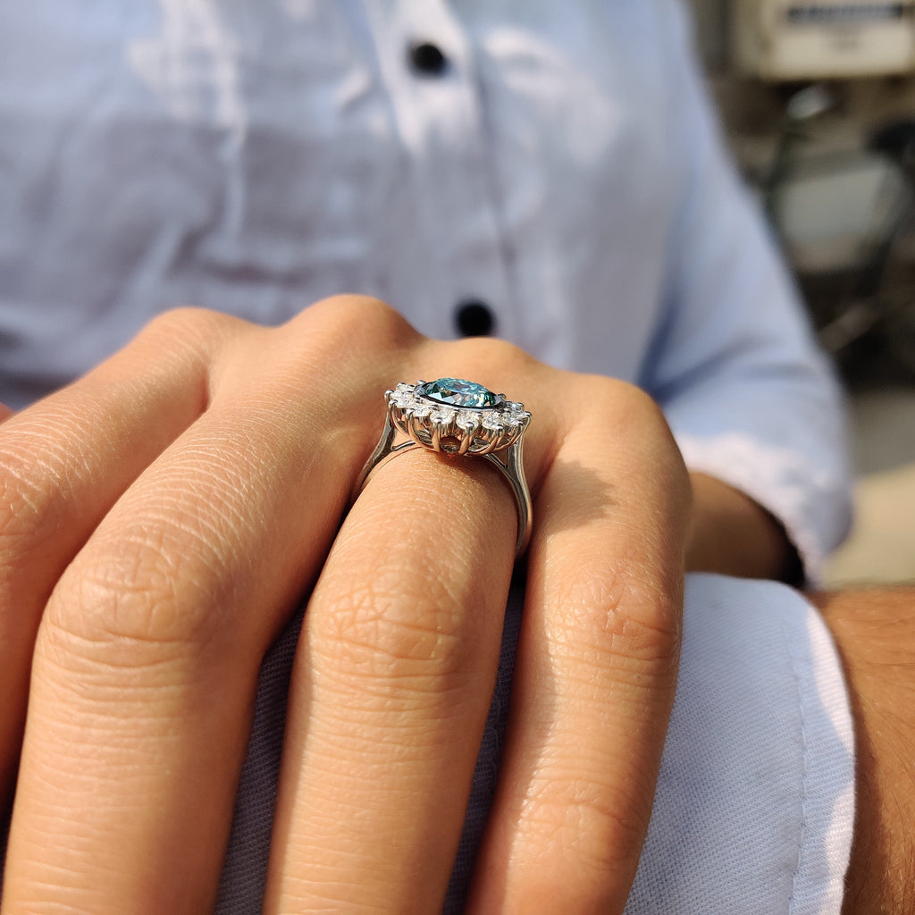 Halo And Bezel Portuguese Cut Engagement Ring