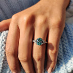 Cyan Blue Moissanite Oval Side Stone Engagement Ring