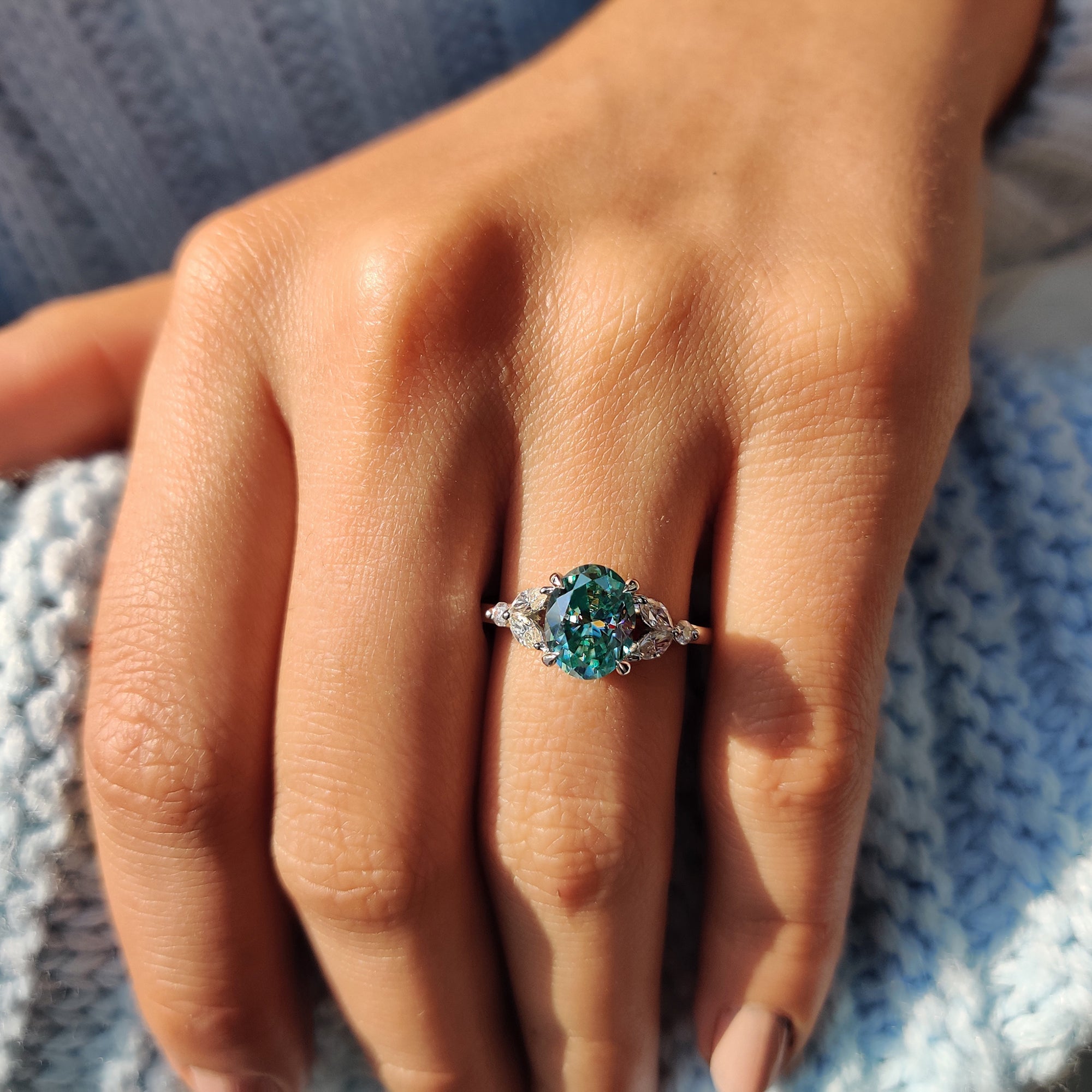Cyan Blue Moissanite Oval Side Stone Engagement Ring