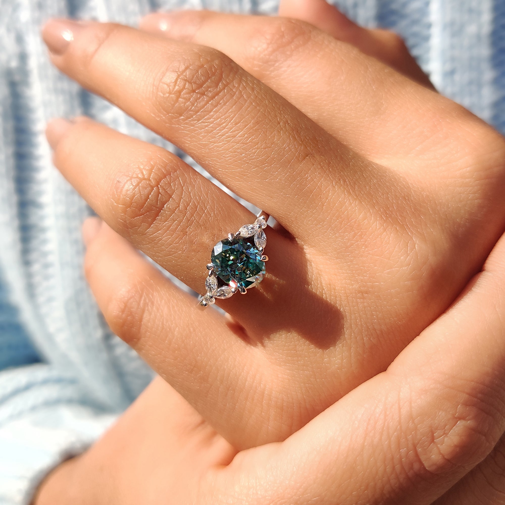 Cyan Blue Moissanite Oval Side Stone Engagement Ring
