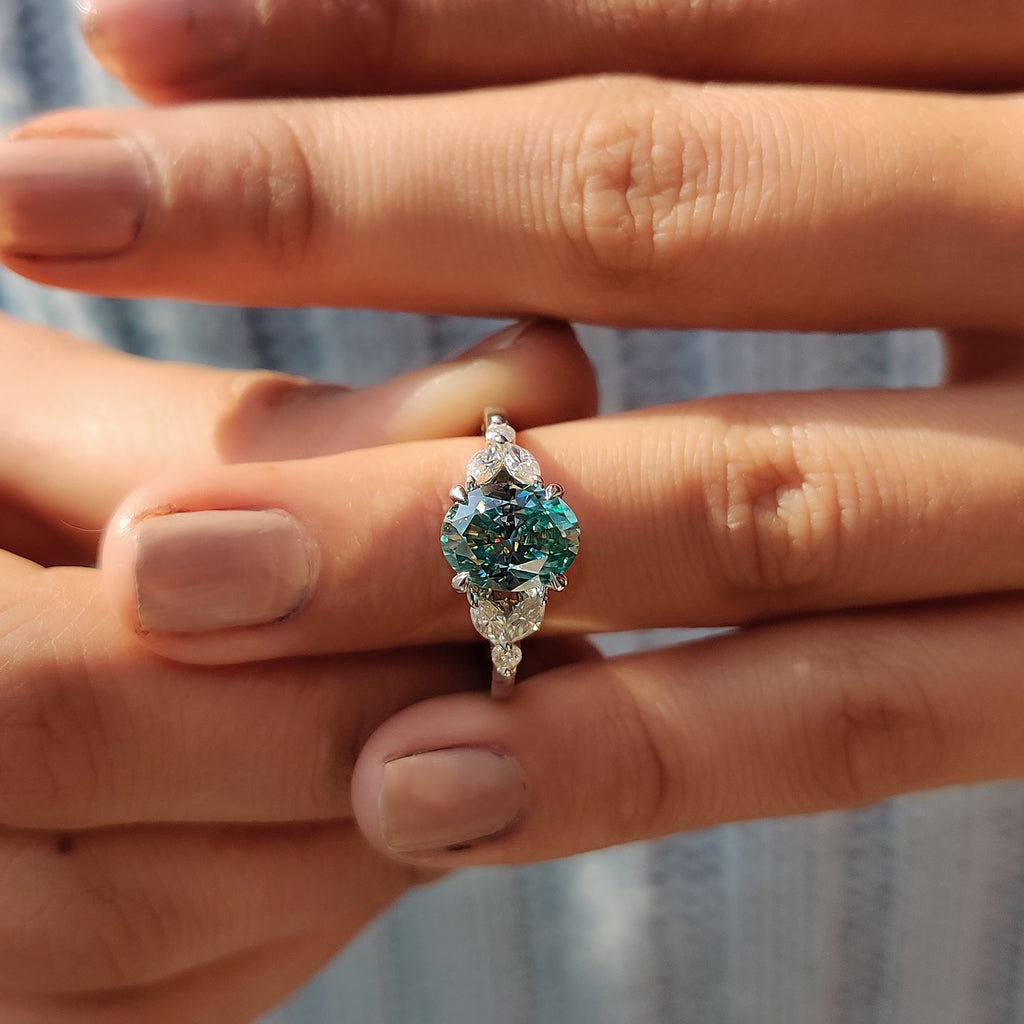 Cyan Blue Moissanite Oval Side Stone Engagement Ring