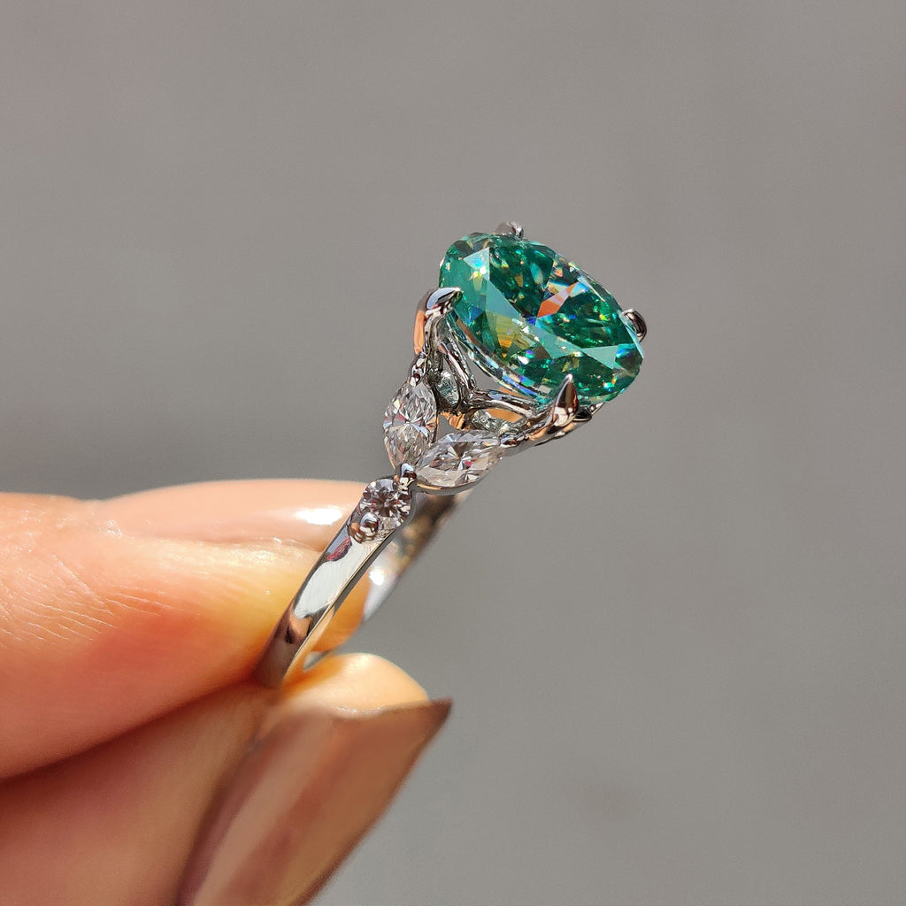 Cyan Blue Moissanite Oval Side Stone Engagement Ring