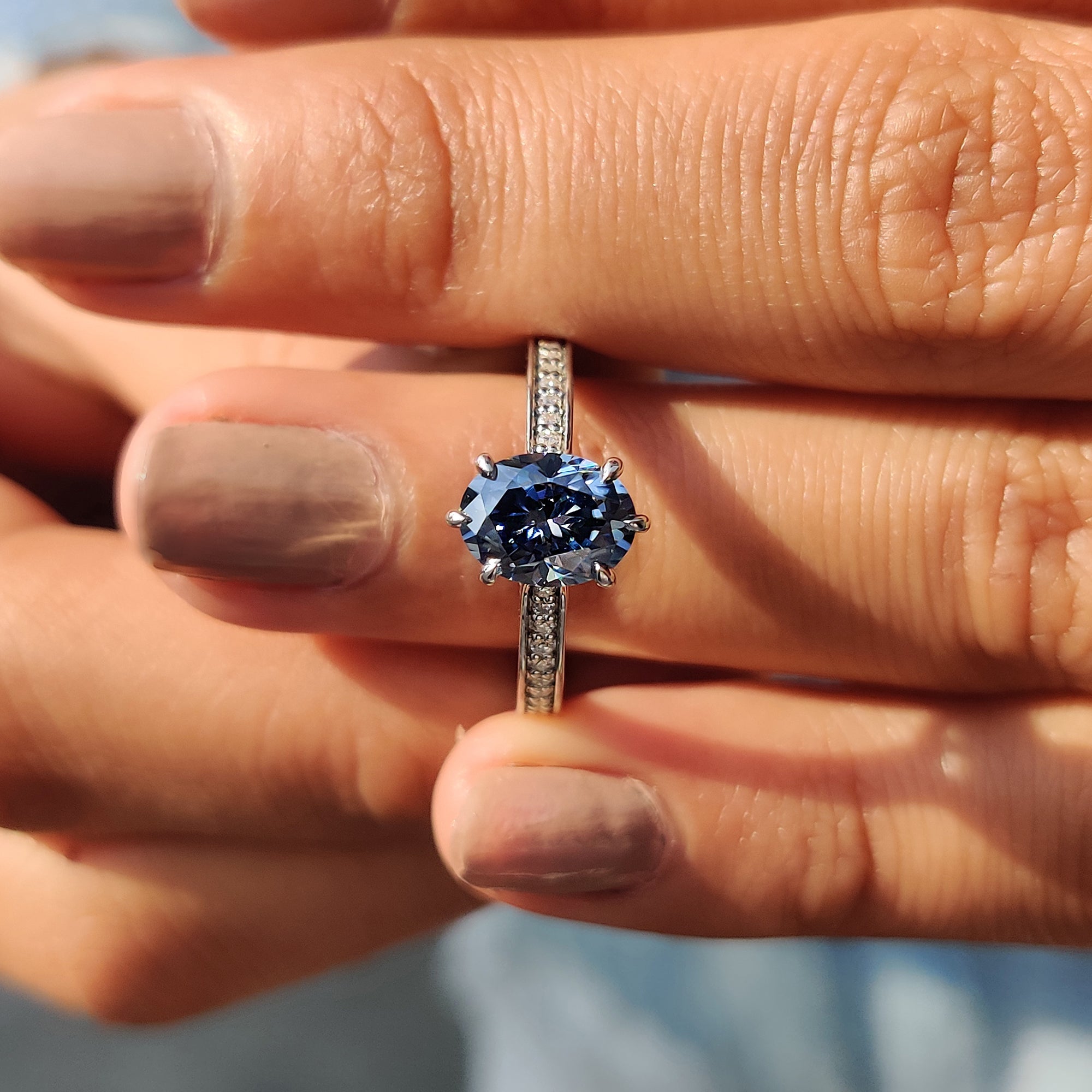 Channel Set Oval Cut Moissanite Ring