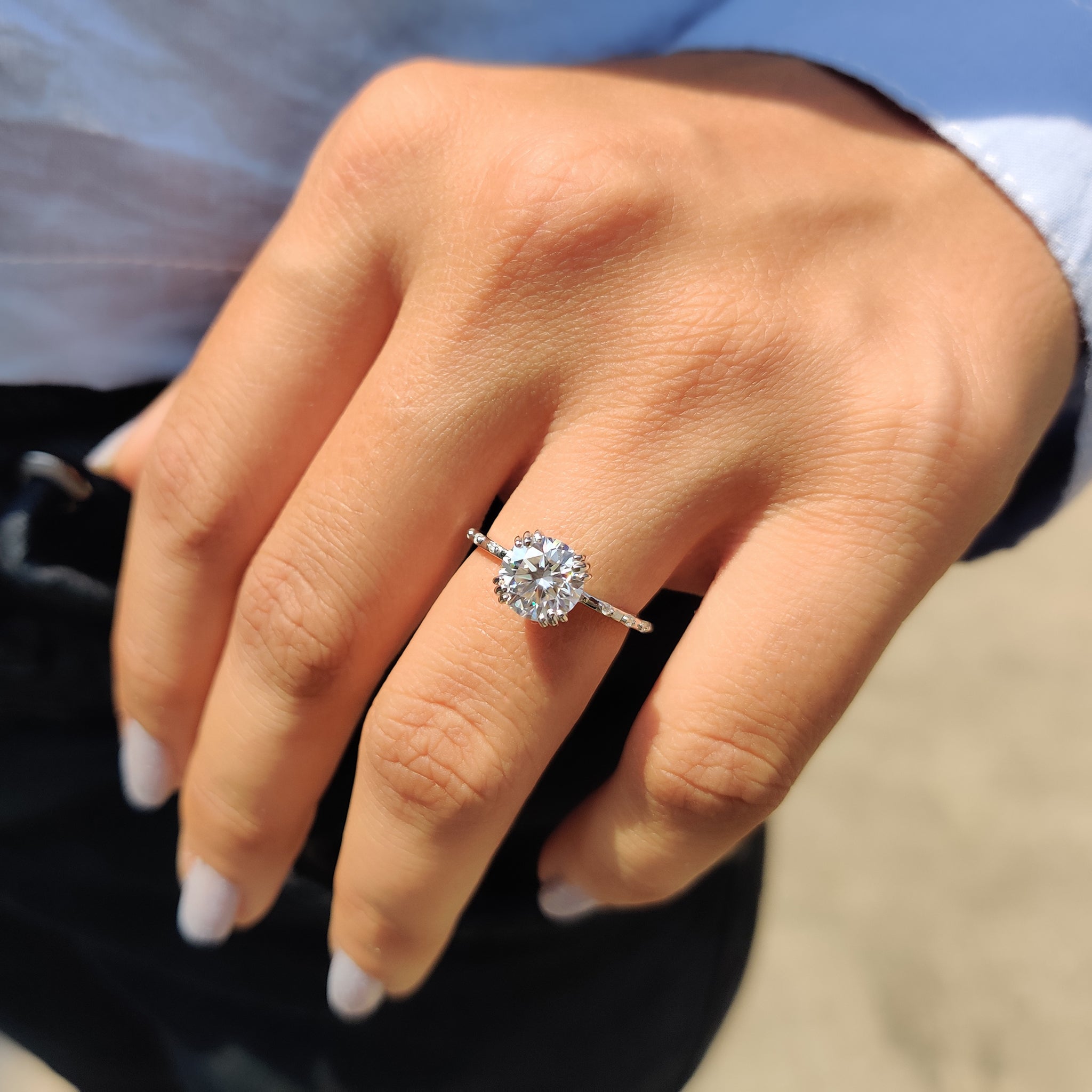 Round Cut Engagement Ring With Distance Pave Band