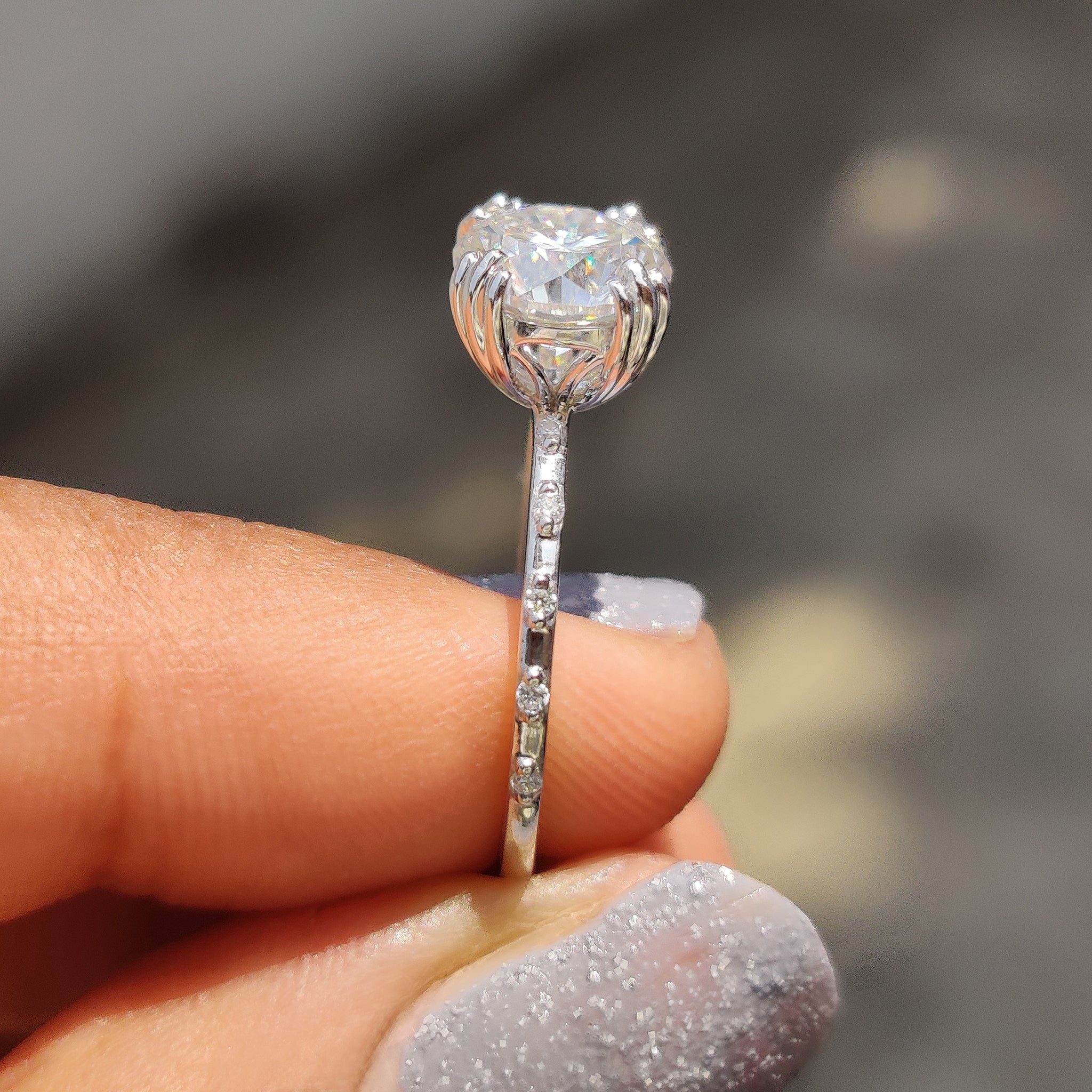 Round Cut Engagement Ring With Distance Pave Band