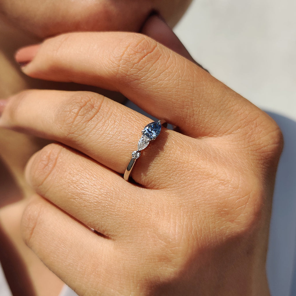 Royal Blue Pear Three Stone Engagement Ring