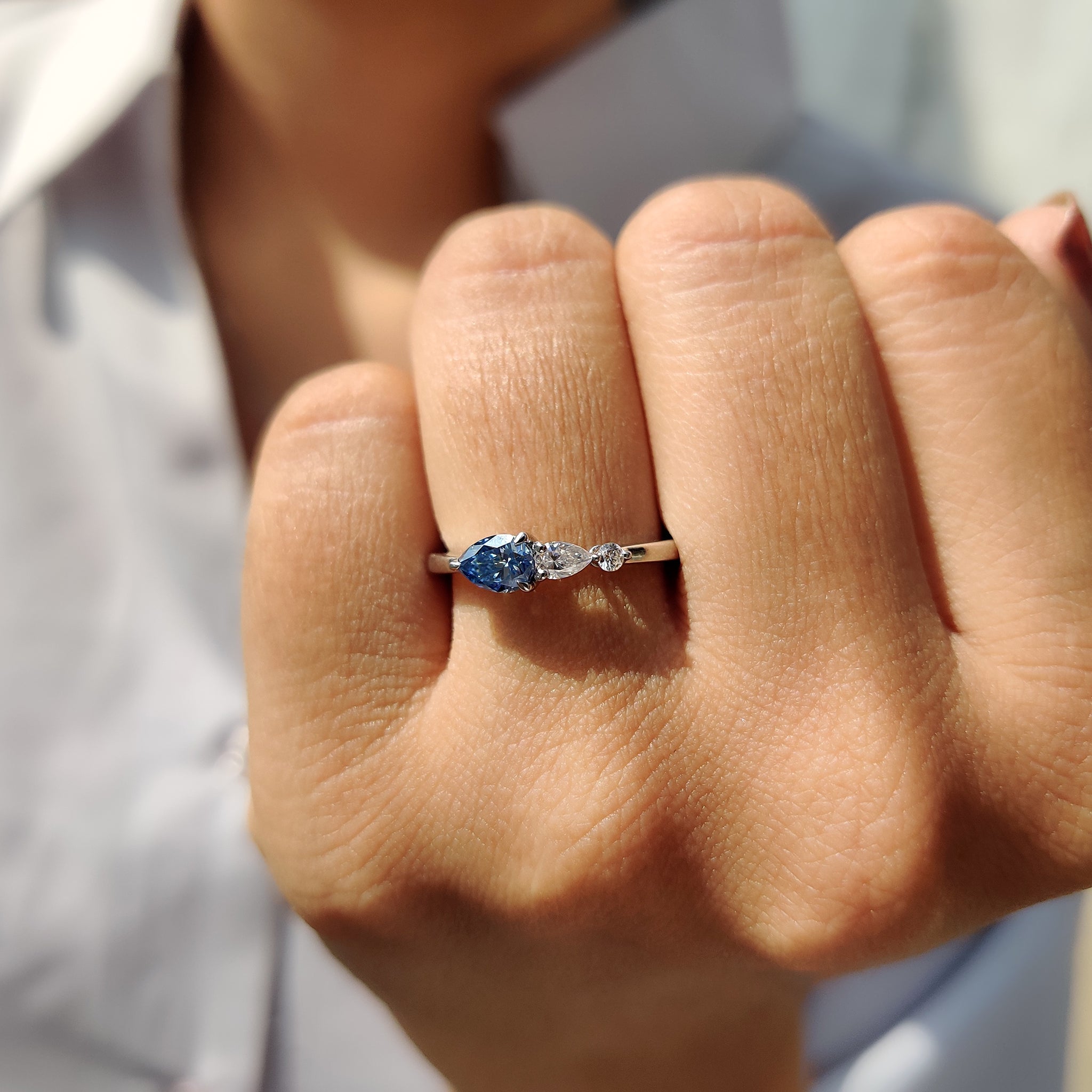 Royal Blue Pear Three Stone Engagement Ring