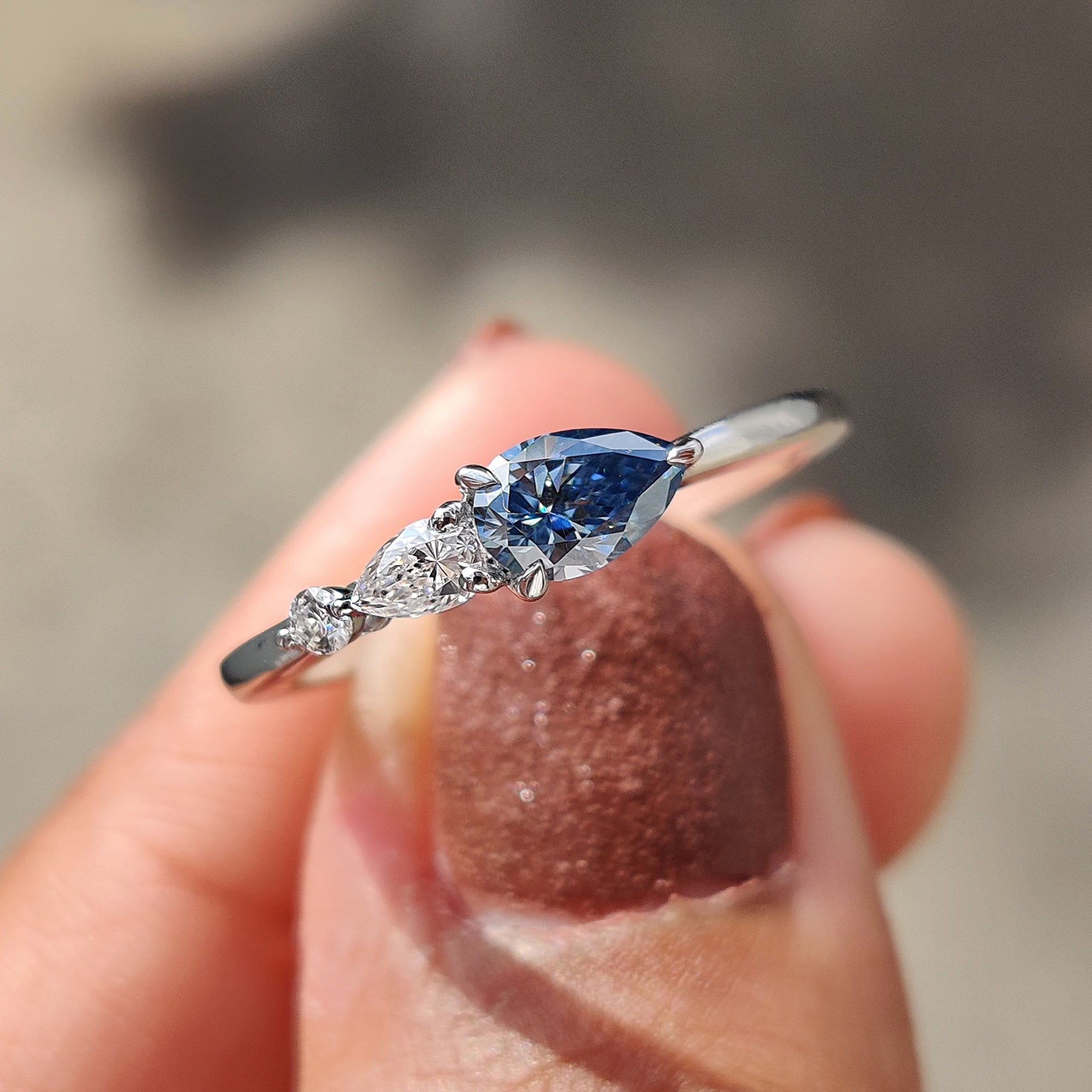 Royal Blue Pear Three Stone Engagement Ring