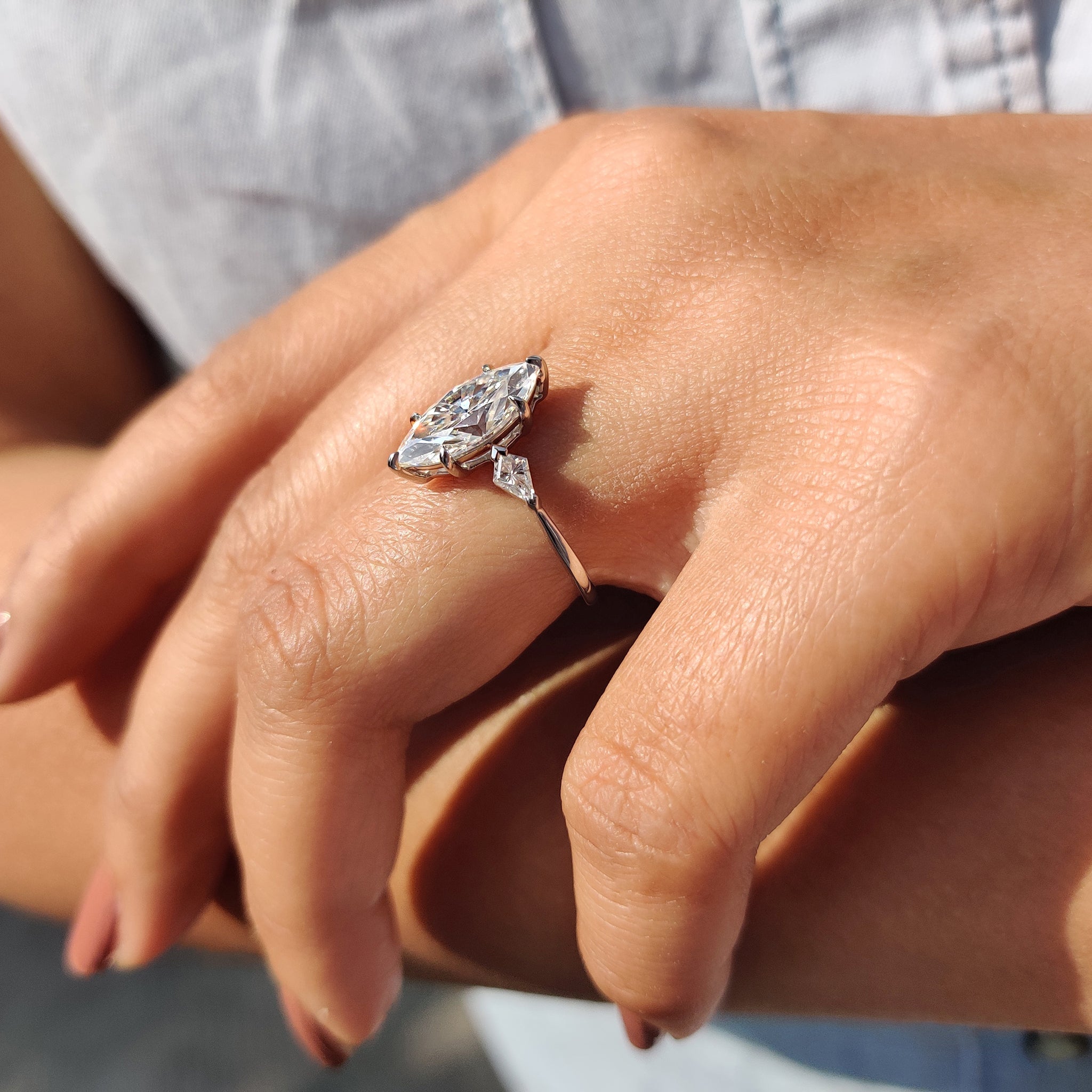 Marquise Moissanite Ring With 2 Kite Side Stone
