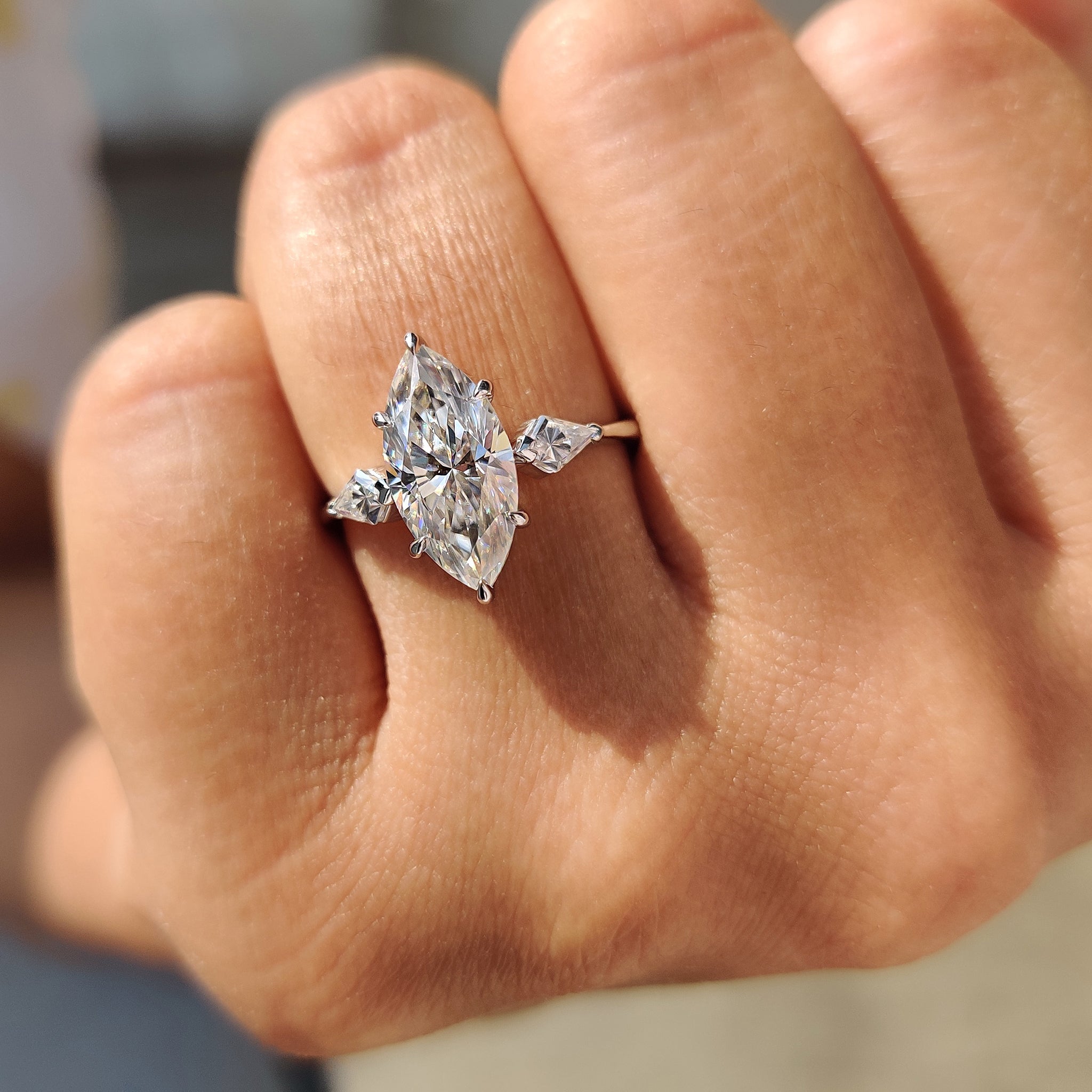 Marquise Moissanite Ring With 2 Kite Side Stone Main image