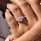 Moissanite Pear Ring With Marquise And Round Cut Side Stone