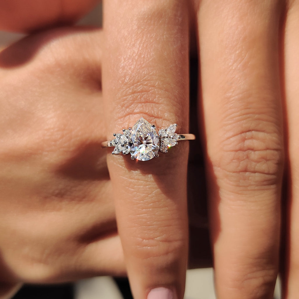 Moissanite Pear Ring With Marquise And Round Cut Side Stone