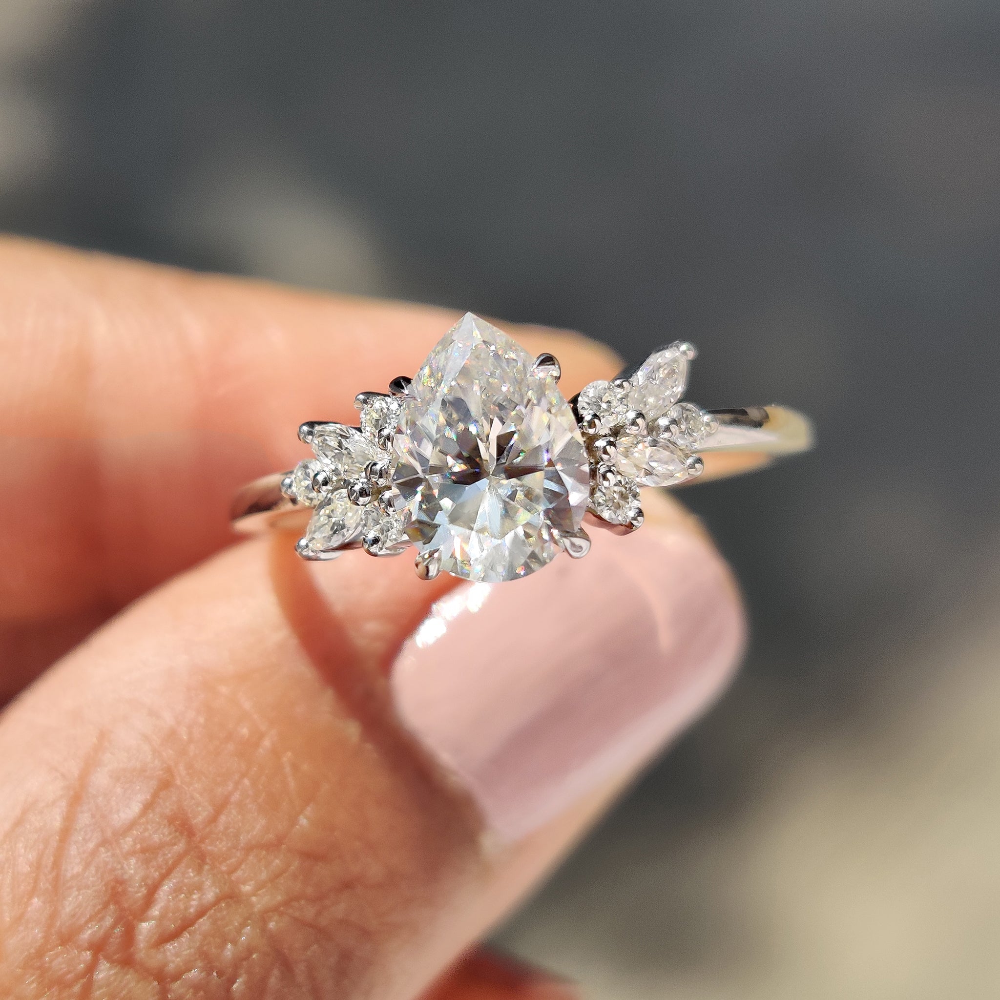 Moissanite Pear Ring With Marquise And Round Cut Side Stone Main image