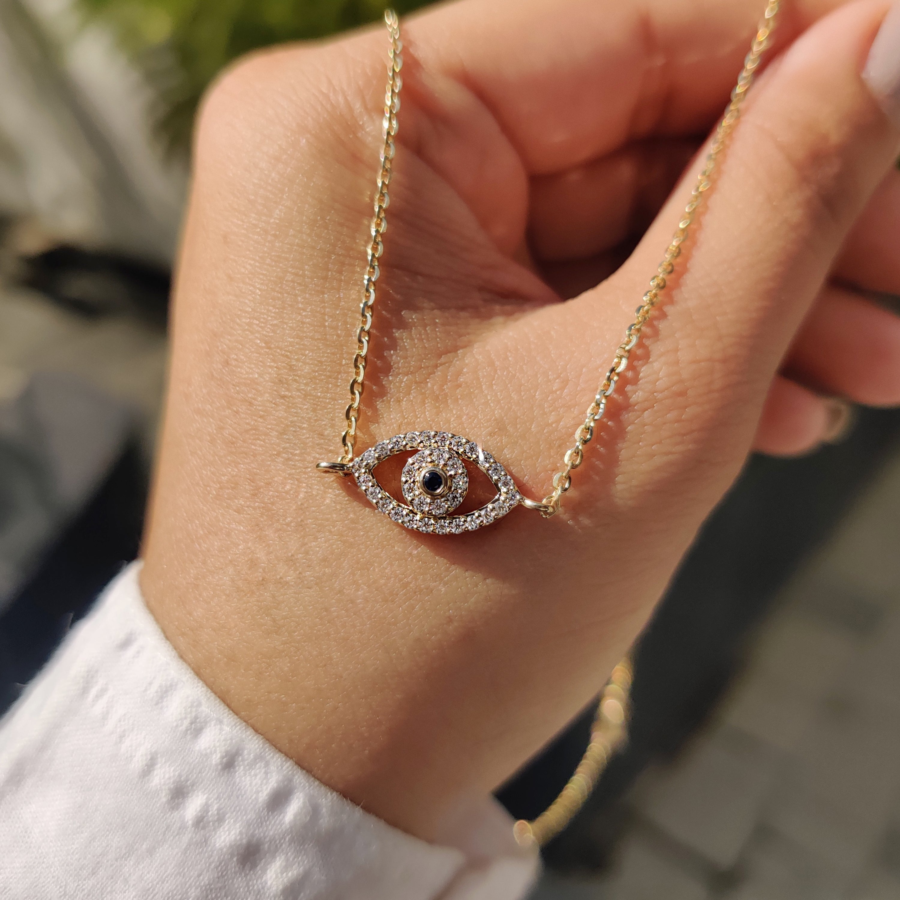 Round Cut Eye Shape Blue Diamond Pendant With Chain Main image