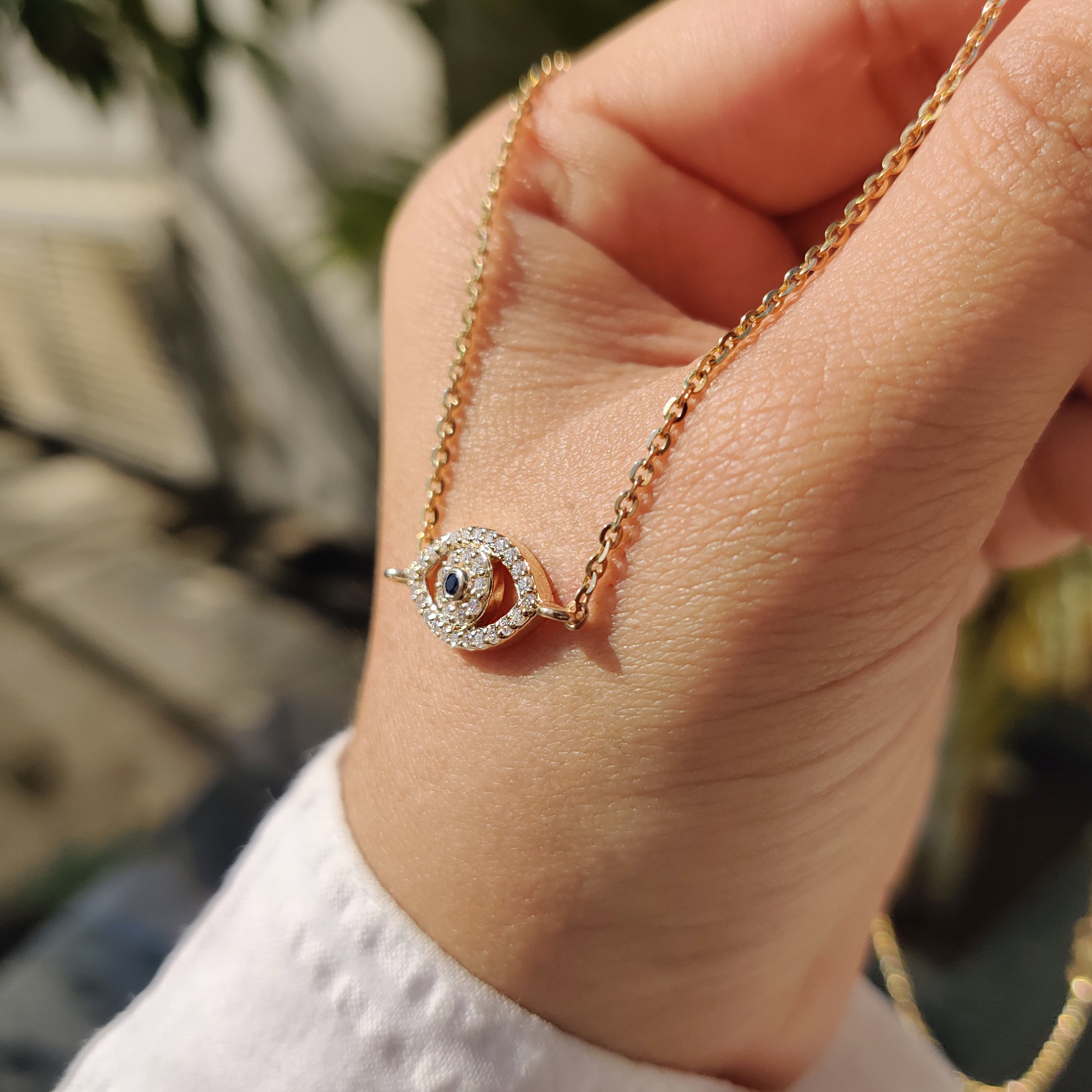 Round Cut Eye Shape Blue Diamond Pendant With Chain Secondary image