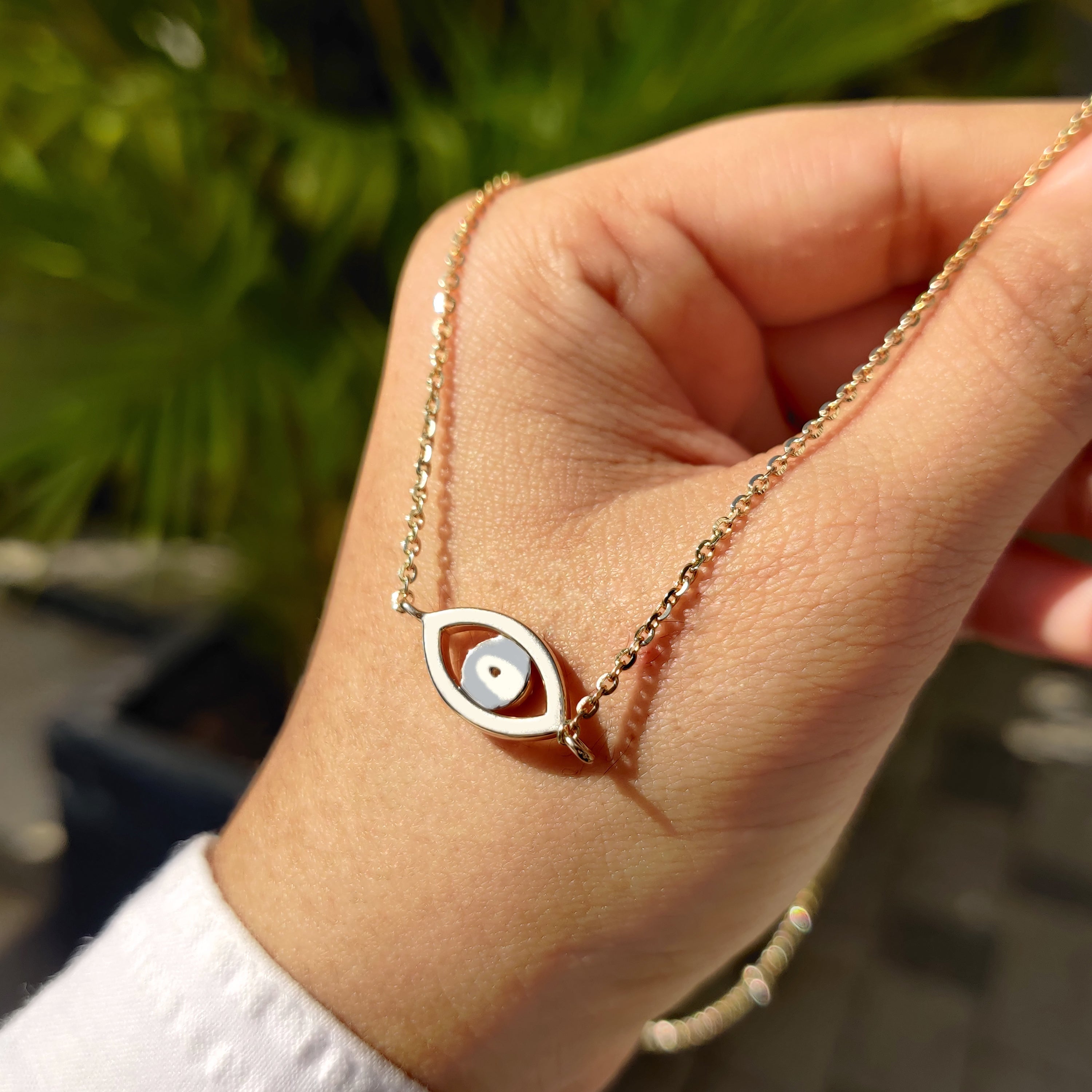 Round Cut Eye Shape Blue Diamond Pendant With Chain