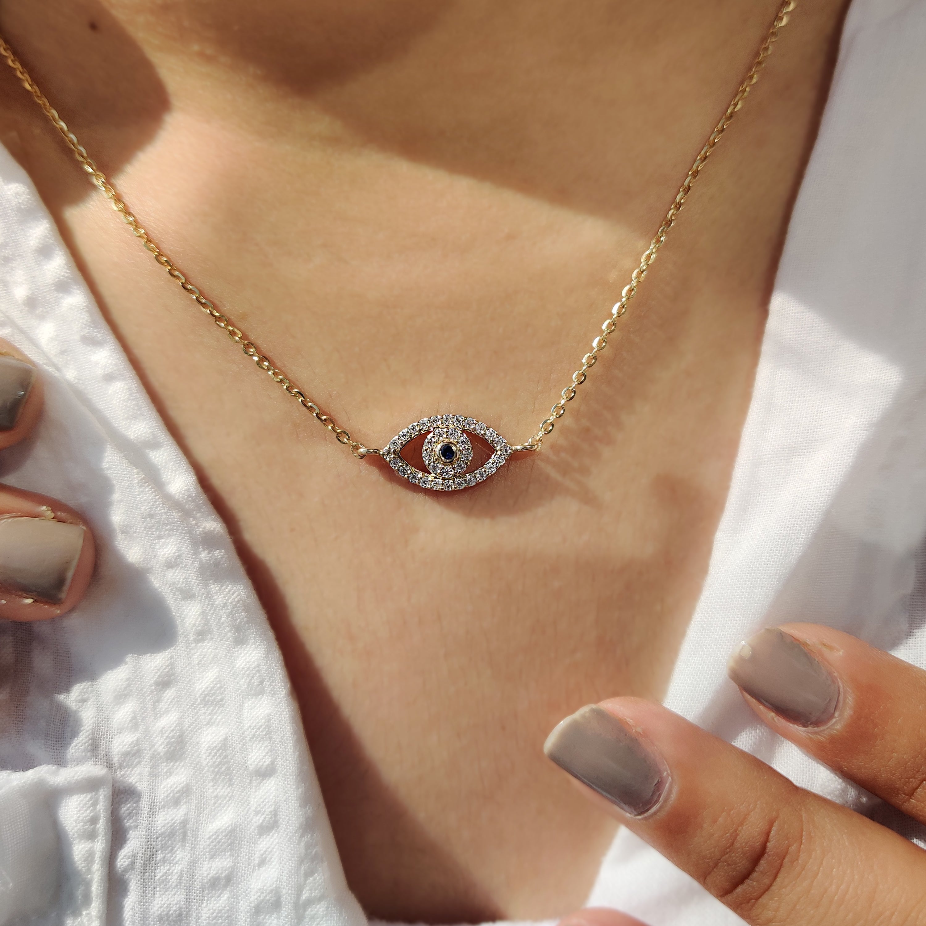 Round Cut Eye Shape Blue Diamond Pendant With Chain