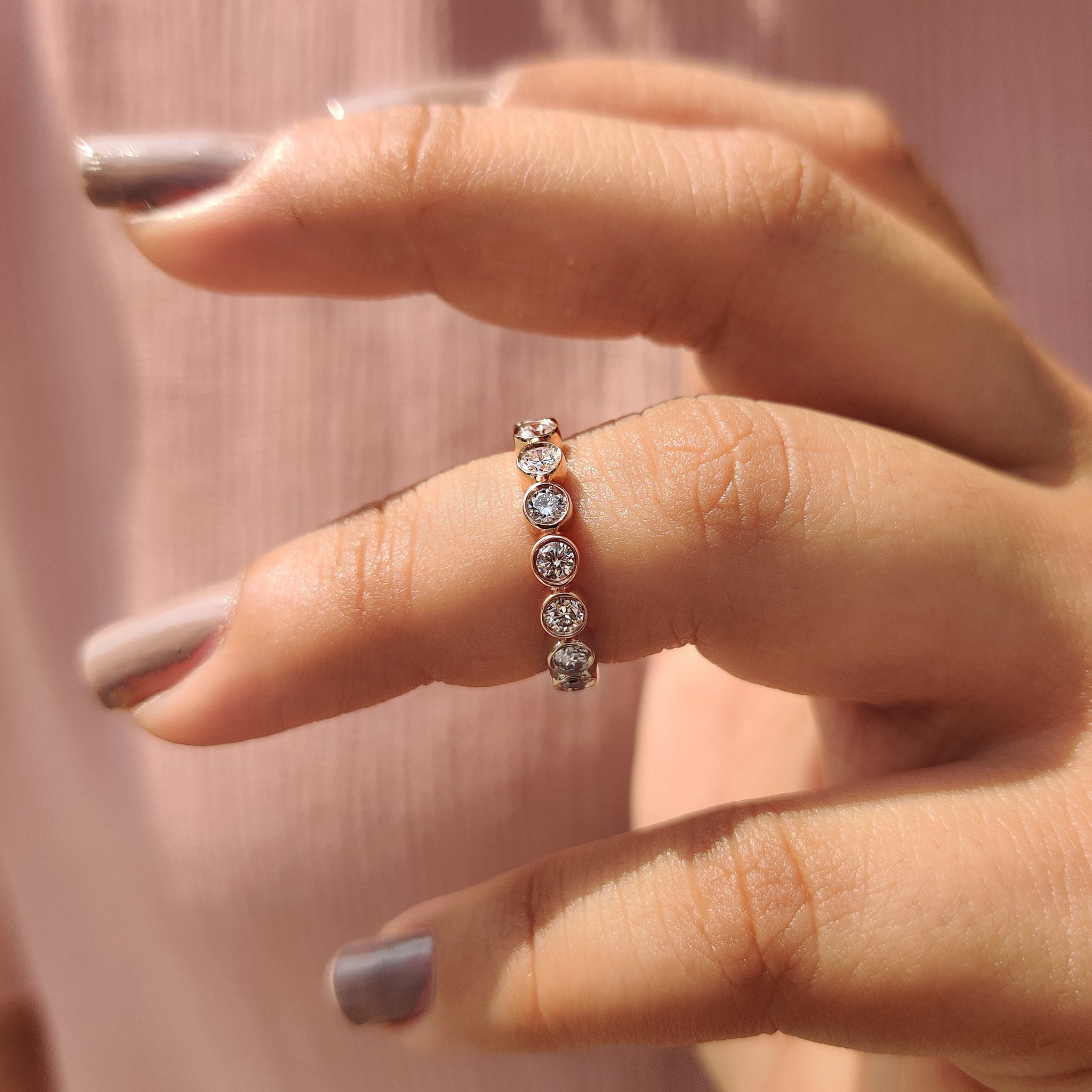Round Diamond Bezel Set Eternity Band
