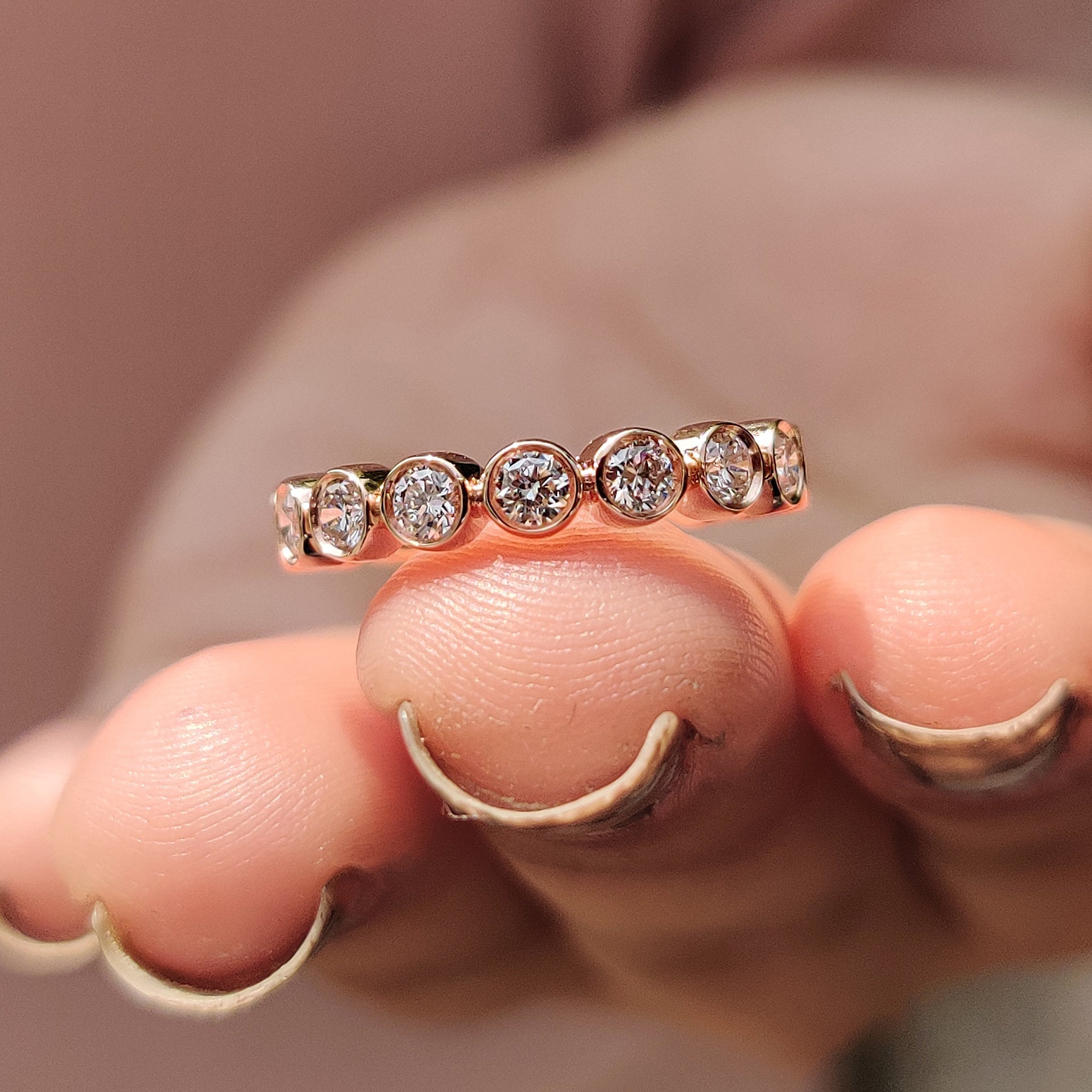 Gold Eternity Band – Round Cut Bezel Setting