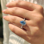 Cyan Blue Pear Diamond Ring In cathedral setting