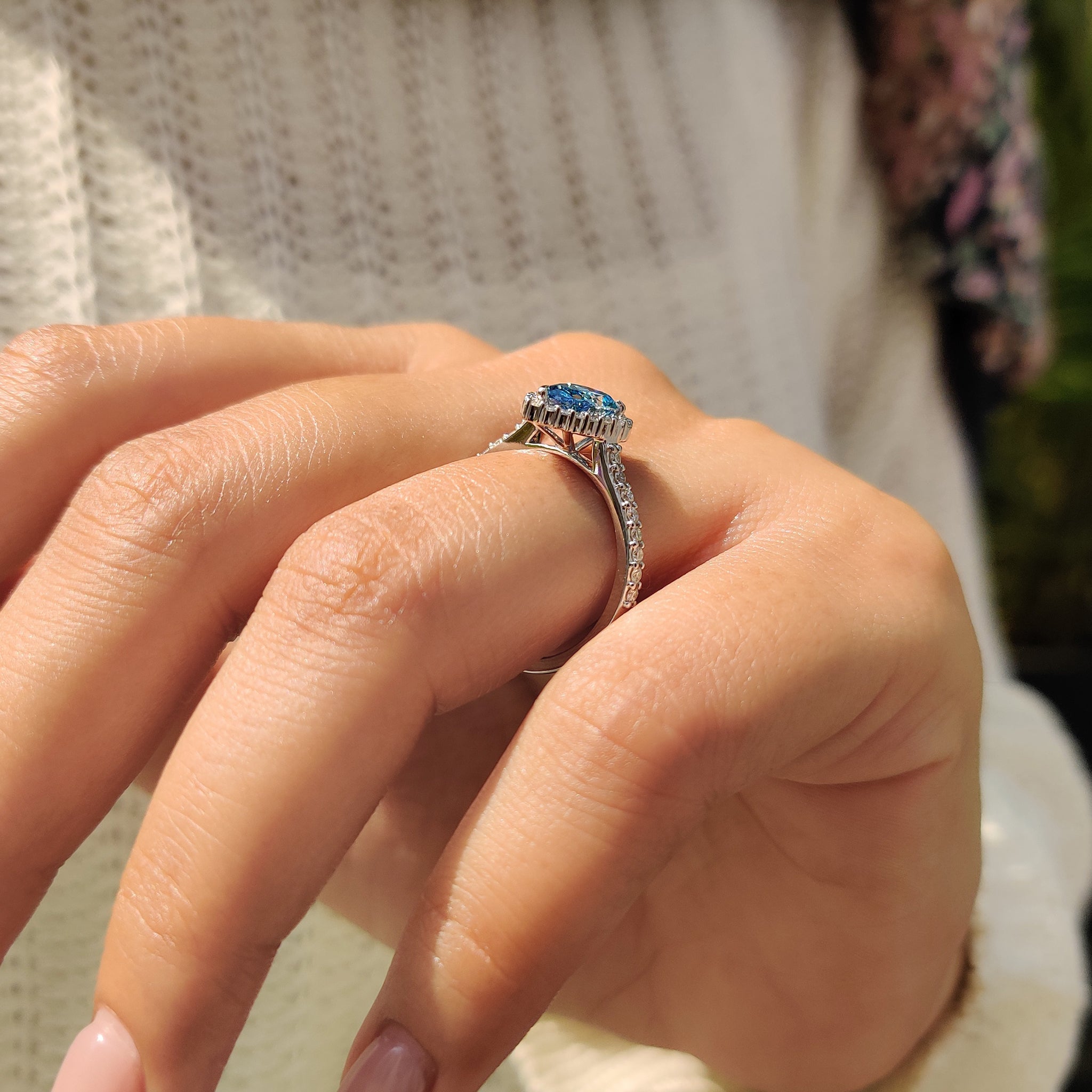 Cyan Blue Pear Diamond Ring In cathedral setting