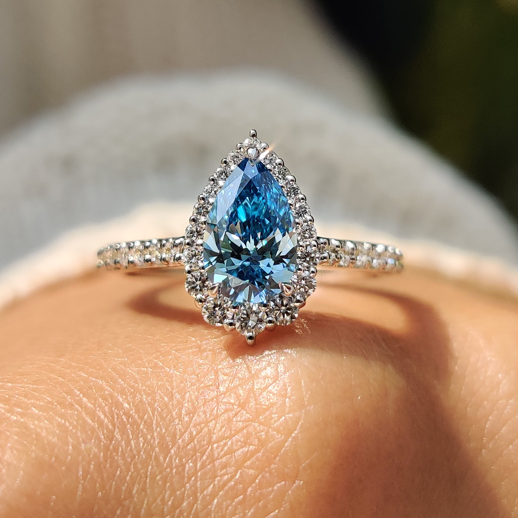 Cyan Blue Pear Diamond Ring In cathedral setting Main image