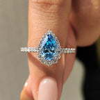 Cyan Blue Pear Diamond Ring In cathedral setting