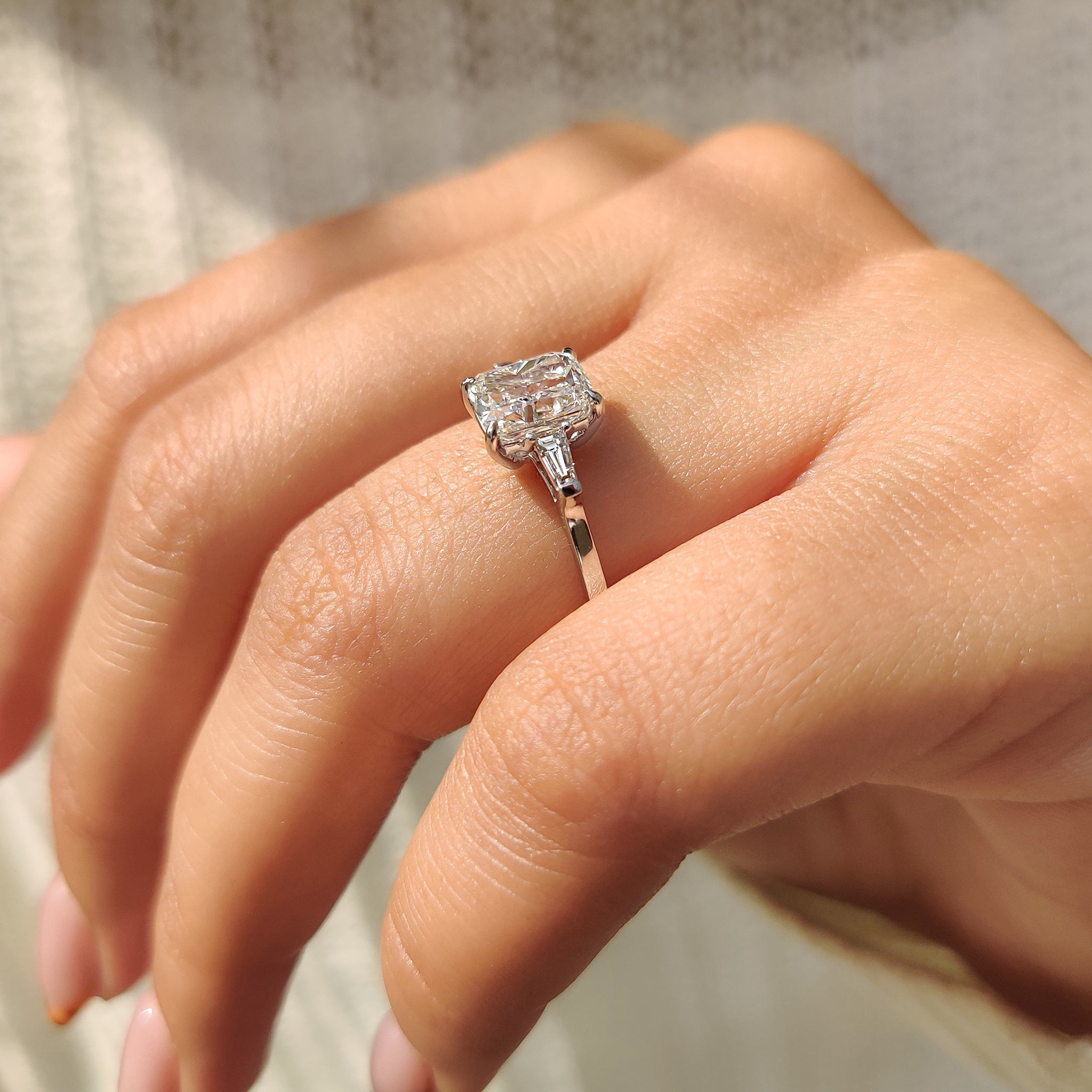 3 Stone Engagement Ring With Cushion And Tapered Baguette