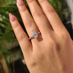 Pear Diamond Ring With Round Side Stone