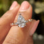Pear Diamond Ring With Round Side Stone