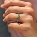 Light Green Round Gemstone Eternity Band In Shaped Prong Style