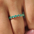 Light Green Round Gemstone Eternity Band In Shaped Prong Style