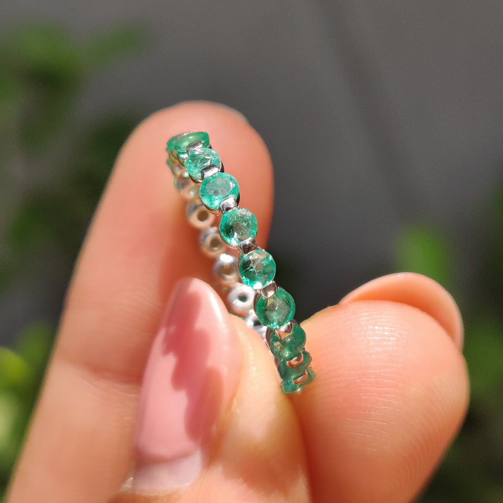 Light Green Round Gemstone Eternity Band In Shaped Prong Style