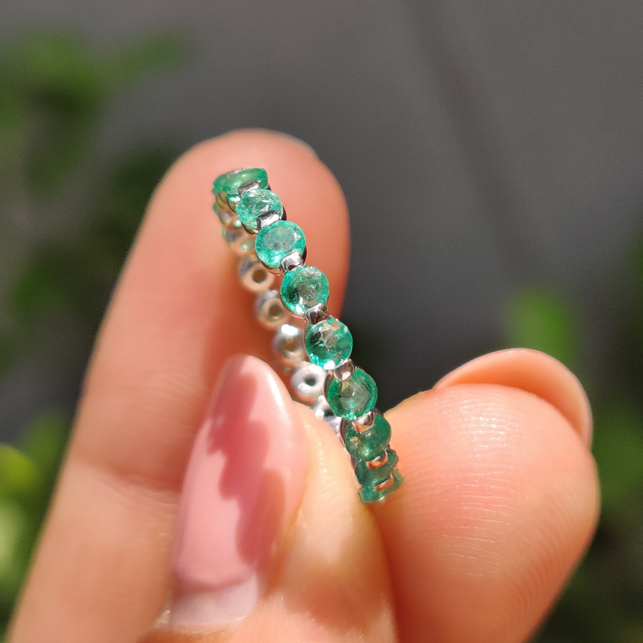 Light Green Round Gemstone Eternity Band In Shaped Prong Style