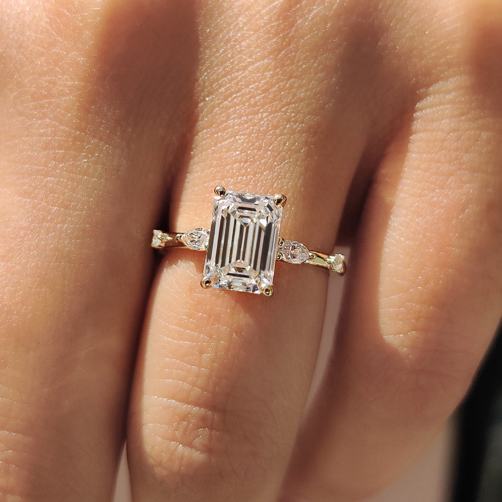 5 Stone Emerald Cut Diamond Ring With Marquise Side Stone