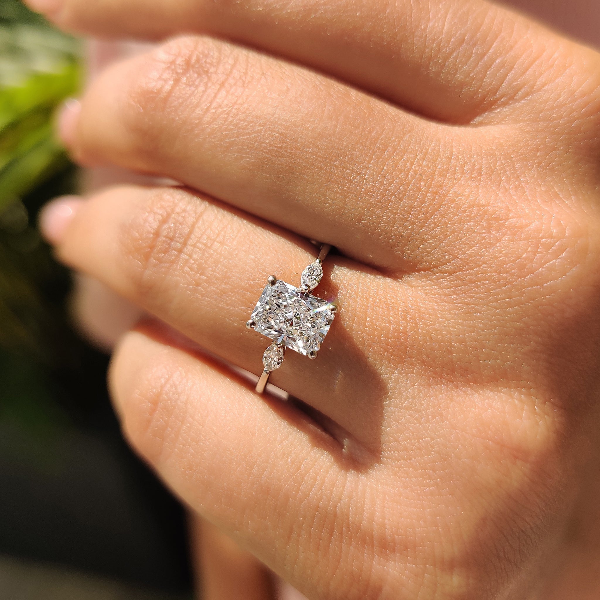 Radiant Cut Diamond Ring With Marquise Side Stone Secondary image