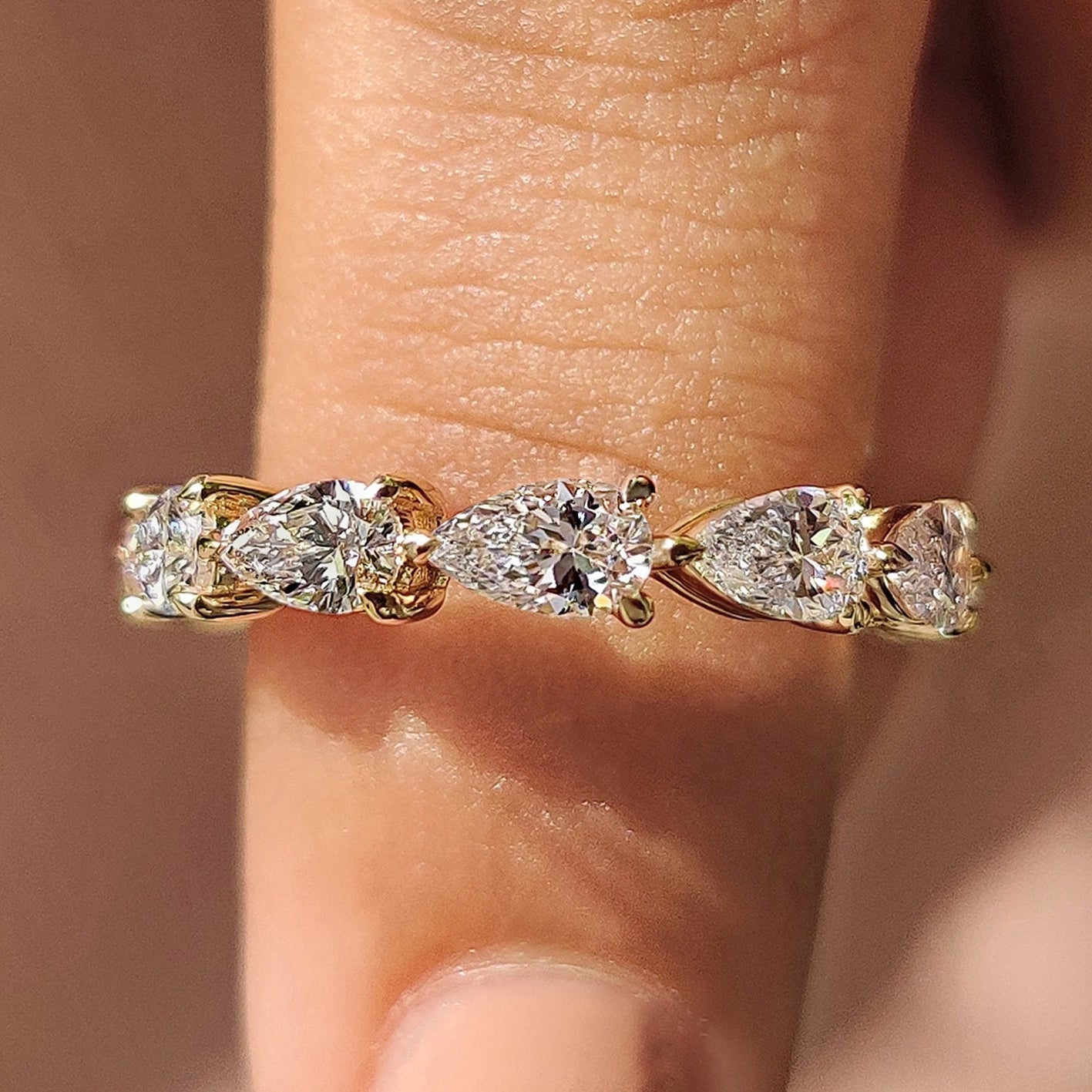 Pear Shaped Diamond Band In 3/4 Eternity Style